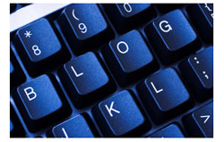 Computer keyboard with the word blog spelled out in the keys